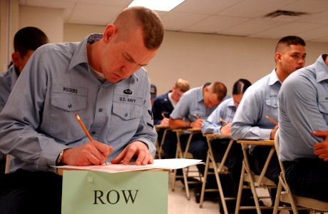 US Navy 040311-N-2413T-002 Sailors assigned to USS Nimitz (CVN 68) concentrate on taking the Navy-wide Second Class (E-5) Advancement Exam photo