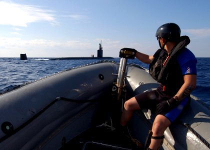 US Navy 040313-N-4374S-001 Signalman 2nd Class David Juarez, Search and Rescue (SAR) swimmer assigned to the guided missile destroyer USS Roosevelt (DDG 80), travels en route to the Los Angeles-Class attack submarine USS Toledo
