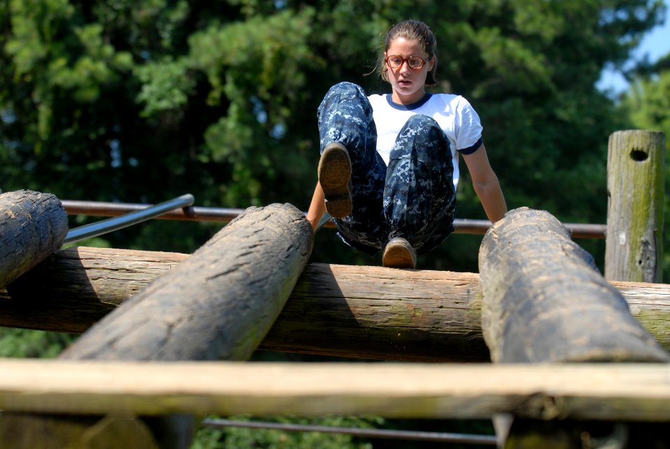 US Navy 110712-N-OA833-001 A Plebe in the U.S. Naval Academy Class of 2015 makes her way through the school's obstacle course