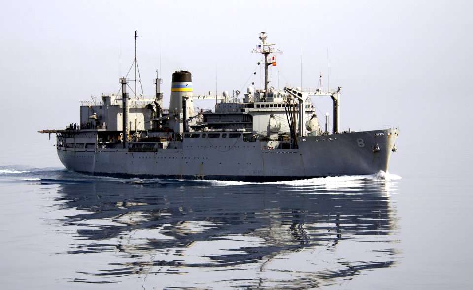 US Navy 040306-N-5319A-004 The Military Sealift Command (MSC) combat stores ship USNS Sirius (T-AFS 8) cruises along side USS George Washington (CVN 73) during a vertical replenishment evolution