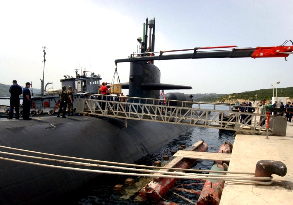 US Navy 040412-N-0780F-091 The Los Angeles-class attack submarine USS Dallas (SSN 700) receives cargo during a brief port visit to Souda Bay