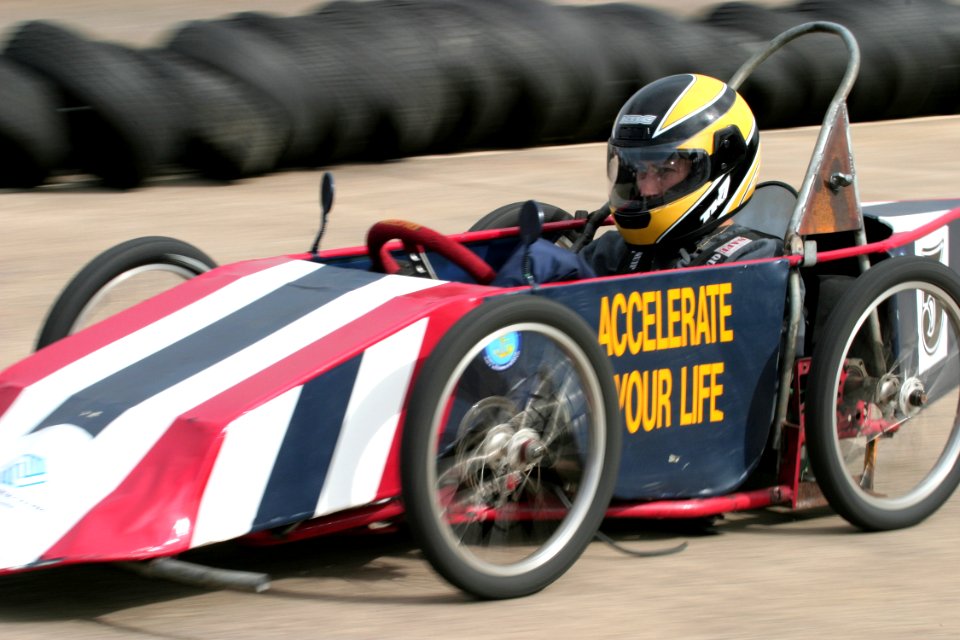 US Navy 040320-N-3228G-007 Operations Specialist 2nd Class Michael Bonincontri, assigned to Naval Station Pearl Harbor, races down a straightaway in front of a crowd over 3,000 spectators at the 9th Annual Hawaiian Electric Ele
