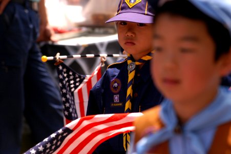 US Navy 040515-N-1194D-010 A young Japanese Cub Scout marches in a parade during the 65th Shimoda Black Ship Festival