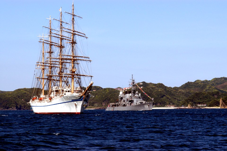 US Navy 040515-N-1194D-001 Japanese tall ship Nippon Maru and a Japan Maritime Self Defense Force (JMSDF) ship anchor just outside Shimoda during the 65th Shimoda Black Ship Festival