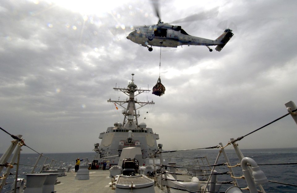US Navy 040424-N-5319A-002 An MH-60S Knighthawk delivers cargo to USS Bulkeley (DDG 84)