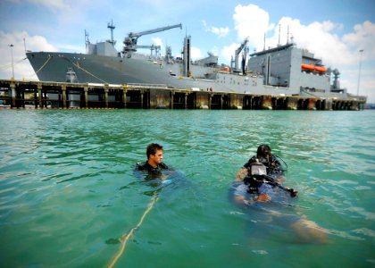 US Navy 110818-N-KB666-239 Navy Diver 2nd Class Ryan Arnold divers during a familiarization dive