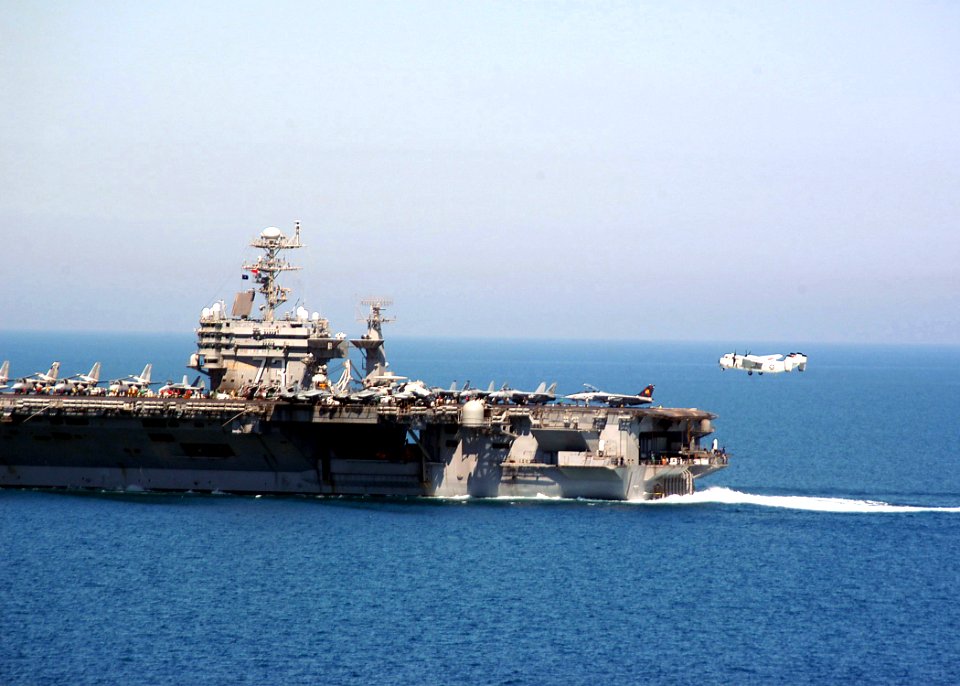 US Navy 040324-N-6278K-133 A C-2A Greyhound assigned to the Rawhides of Carrier Logistics Support Squadron Four Zero (VRC-40) prepares to make an arrested landing on the flight deck aboard USS George Washington (CVN 73)
