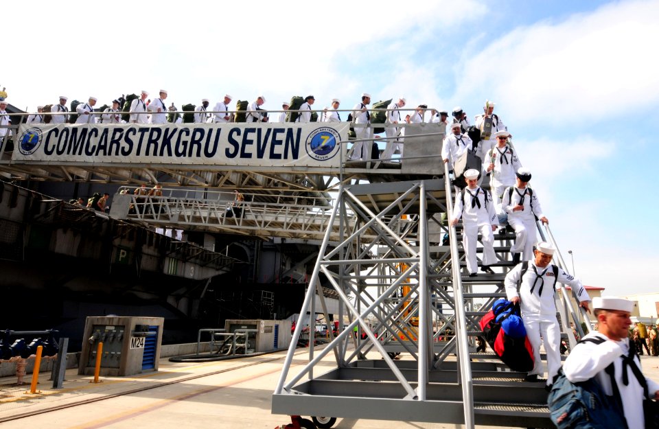 US Navy 110909-N-NB544-351 Sailors depart USS Ronald Reagan (CVN 76) after liberty call