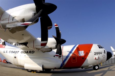 US Navy 040514-N-0295M-004 A U.S. Coast Guard HC-130J King extended-range combat rescue aircraft sits on the flight line