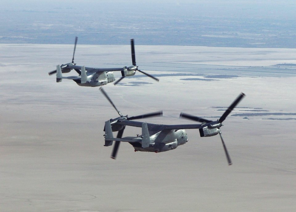 US Navy 040411-N-9999X-001 Osprey No. Seven flies in formations with Osprey No. Nine during a recent test flight