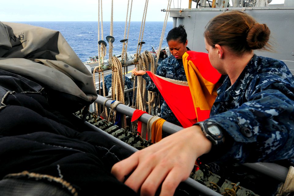 US Navy 110823-N-EE987-181 A Sailor shows the Romeo flag during Sea and Anchor detail