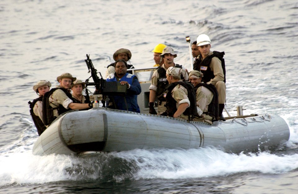 US Navy 040423-N-5319A-003 The Visit Board Search and Seizure team (VBSS) assigned to USS Bulkeley (DDG 84) cruises in a Rigid Hull Inflatable Boat (RHIB)