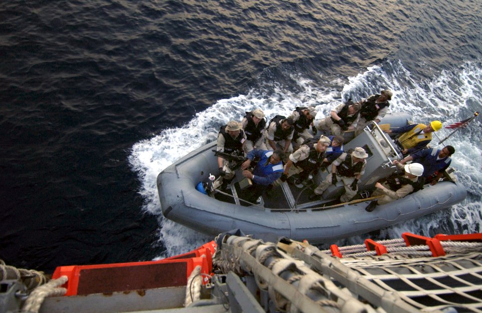 US Navy 040423-N-5319A-013 The Visit Board Search and Seizure team (VBSS) assigned to USS Bulkeley (DDG 84) returns in a Rigid Hull Inflatable Boat (RHIB)