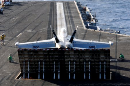 US Navy 111207-N-YC505-027 A jet prepares to launch from the flight deck