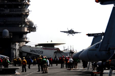 US Navy 110621-N-UO379-200 An F-A-18E Super Hornet makes its final approach to USS Ronald Reagan (CVN 76)