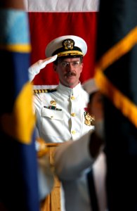 US Navy 040514-N-0905V-032 Capt. Richard B. Wren renders a salute as the color guard assigned to USS Carl Vinson (CVN 70) parades the colors during a change of command ceremony