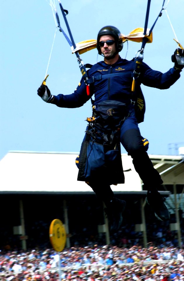 US Navy 040515-N-4729H-065 Lt. Cmdr. Gus Kaminski, officer in charge of the Navy parachute team the Leapfrogs, drops into Pimlico Race Track