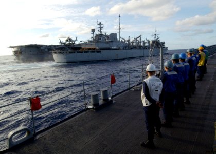 US Navy 040616-N-4374S-005 Sailors aboard the guided missile cruiser USS Vicksburg (CG 69) stand ready for an underway replenishment as the aircraft carrier USS John F. Kennedy (CV 67) receives fuel from the fast combat support