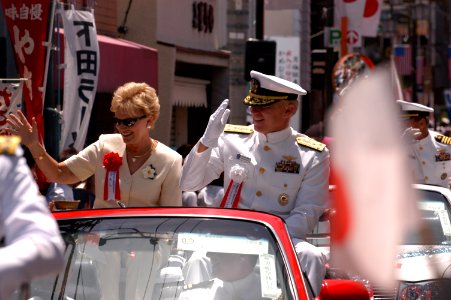 US Navy 040515-N-1194D-007 Vice Adm. Robert F. Willard, Commander Seventh Fleet, salutes while participating in the official party during the 65th Shimoda Black Ship Festival parade