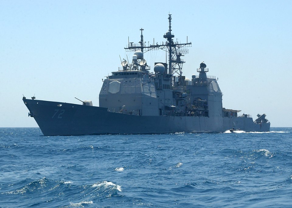 US Navy 040618-N-9954W-011 he guided missile cruiser USS Vella Gulf (CG 72) maneuvers to receive personnel from the Nimitz-class aircraft carrier USS George Washington (CVN 73) by Rigid Hull Inflatable Boat (RHIB)