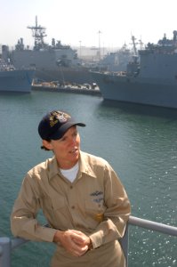 US Navy 040320-N-6499D-048 During Board of Inspection and Survey sea trails, Command Master Chief Kathleen Hansen, of Midland, Mich., discusses successful pre-deployment training of the amphibious dock landing ship USS Pearl Ha