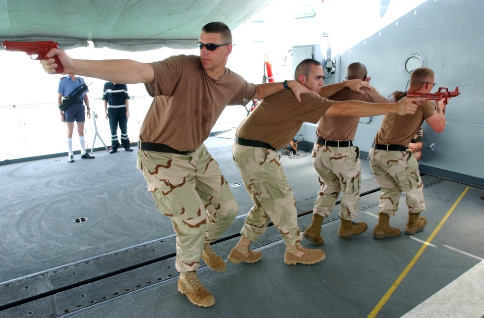 US Navy 040530-C-1034C-038 Members assigned to the U.S. Coast Guard Law Enforcement Detachment Four Zero Three (USCG LEDET- 403), based out of Miami, Fla., teach members of the French, Spanish and Italian Navies basic Law Enfor
