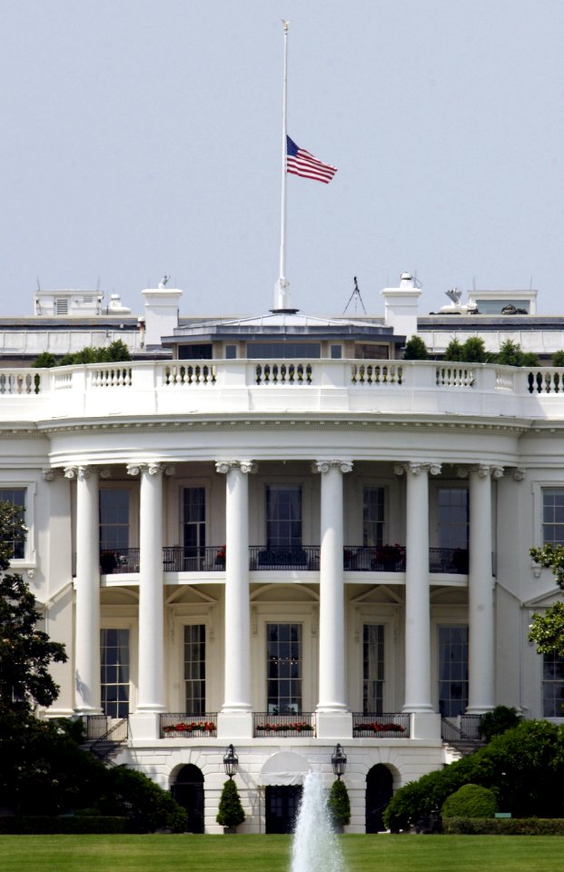 US Navy 040609-F-3050V-009 The U.S. flag atop the White House flies at half-staff in honor of former President Ronald Reagan who passed away on June 5, 2004