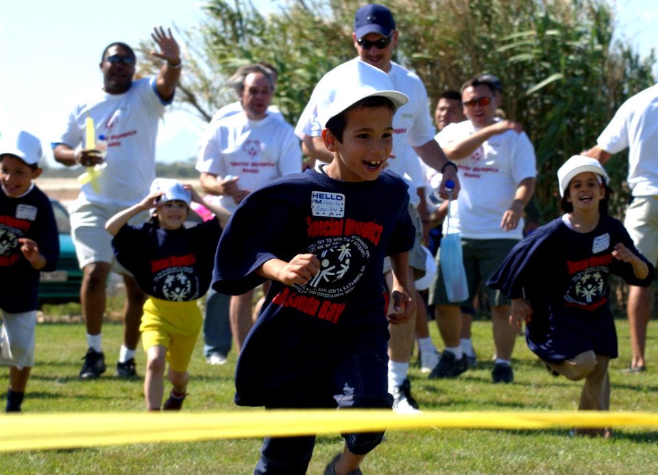 US Navy 040603-N-0780F-035 A student from the Therapeutic and Rehabilitation Center for Children and Youth School in Chania, Crete nears the finish line in a race
