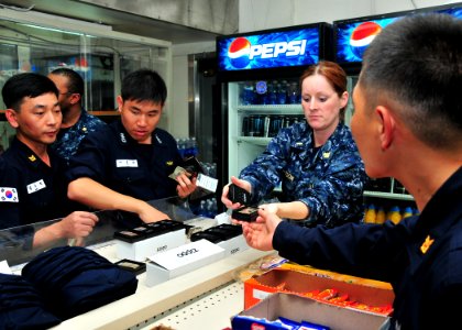 US Navy 111107-N-BK435-060 Sailors from the Republic of Korea navy submarine ROKS Park Wi (SS 065) visit USS Frank Cable (AS 40)