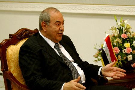 US Navy 040628-F-0193C-001 Prime Minister Ayad Alawi speaks at a ceremony celebrating the transfer of full governmental authority to the Iraqi Interim Government in Baghdad, Iraq