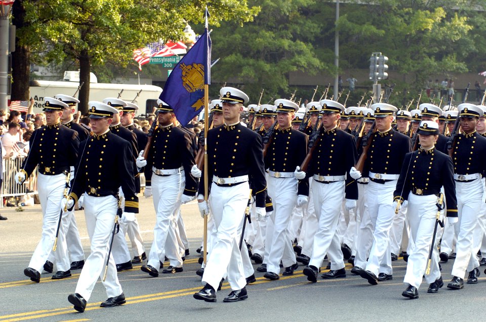 US Navy 040609-A-3085H-216 U.S. Navy Midshipmen from the U.S. Naval Academy participate in the precession, carrying the flag-draped casket of former President Ronald Reagan