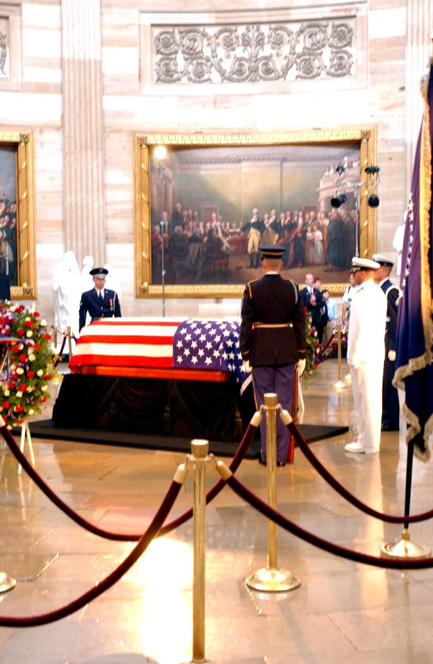 US Navy 040609-A-8024C-013 Ceremonial Honor Guard stand watch over the flag-draped casket of former President Ronald Reagan during his State Funeral in the U.S. Capitol Rotunda
