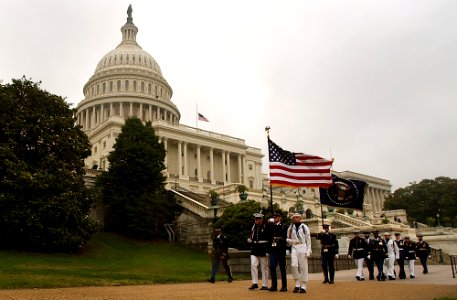 US Navy 040611-N-1810F-007 Members of the Armed Forces Ceremonial Honor Guard march from the Capitol building as a hearse carrying President Ronald Reagan's remains to the grounds of the Washington National Cathedral