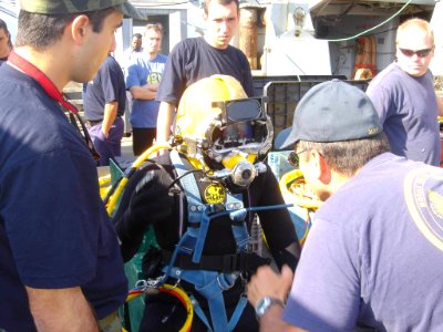 US Navy 040614-N-0000X-001 A Master Diver from Mobile Diving and Salvage Unit Two (MDSU-2) provides safety instructions to a member of the Bulgarian Navy during a recent dive exercise