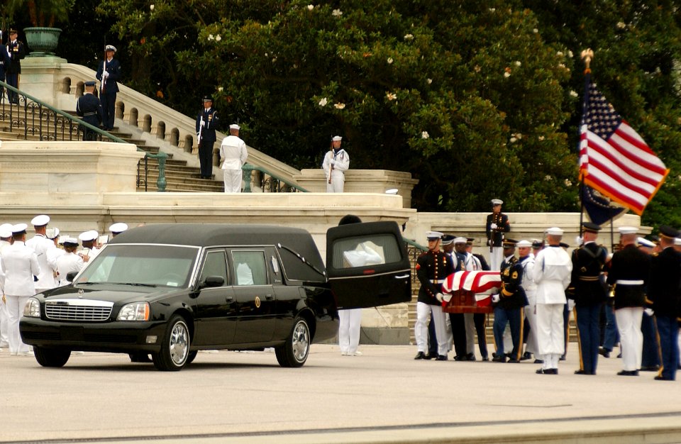 US Navy 040611-N-1810F-005 Members of the Armed Forces Ceremonial Honor Guard place President Ronald Reagan's casket into a hearse which will carry his remains to the grounds of the Washington National Cathedral