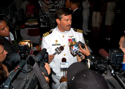 US Navy 040408-N-8704K-003 Capt. Steve Squires addresses local Mayport, Fla. media after assuming command of the aircraft carrier USS John F. Kennedy (CV 67)