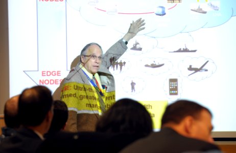 US Navy 111214-N-PO203-034 Dr. Bobby Junker gives a briefing to Department of the Navy officials on a suite of information technology tools that wi