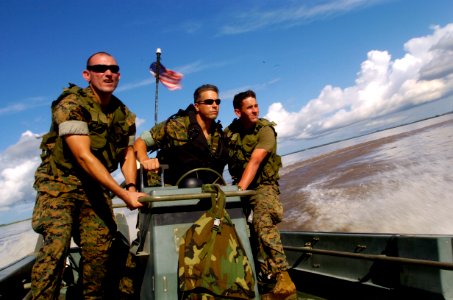 US Navy 040626-N-1464F-007 Rigid Raider small craft on the Amazon River photo