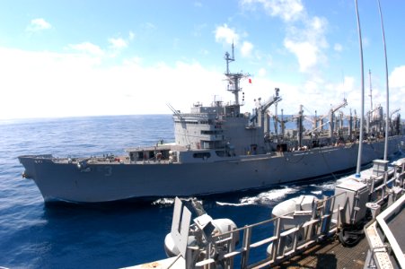 US Navy 040619-N-8704K-004 Fast combat support ship USS Seattle (AOE 3) steams alongside the aircraft carrier USS John F. Kennedy (CV 67) during an underway replenishment