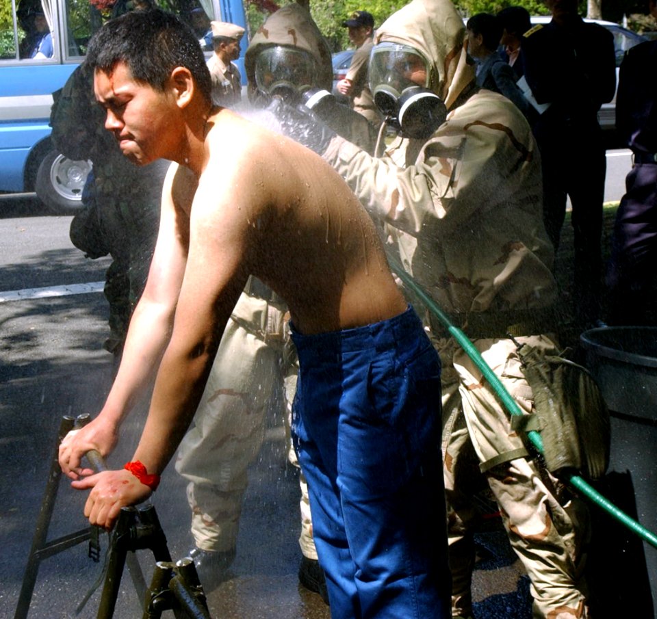 US Navy 040421-N-0000W-144 Sailors assigned to U.S. Naval Hospital Yokosuka Special Medical Operations Response Team (SMORT) practice decontamination procedures