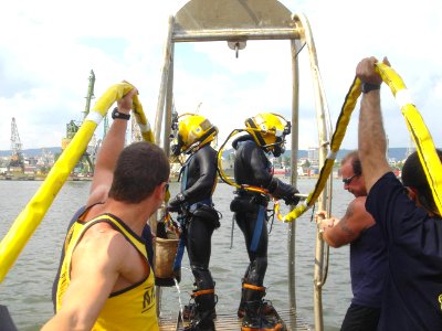 US Navy 040614-N-0000X-002 Divers from Mobile Diving and Salvage Unit Two (MDSU-2) and the Bulgarian Navy prepare to enter the waters of the Black Sea during a recent dive exercise