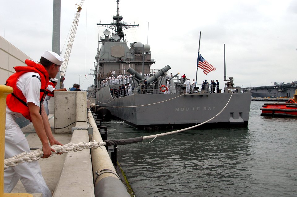 US Navy 040617-N-7615S-036 The guided missile cruiser USS Mobile Bay (CG 53) prepares to depart for a six-month deployment. Mobile Bay is part of the Belleau Wood Expeditionary Strike Group (ESG)