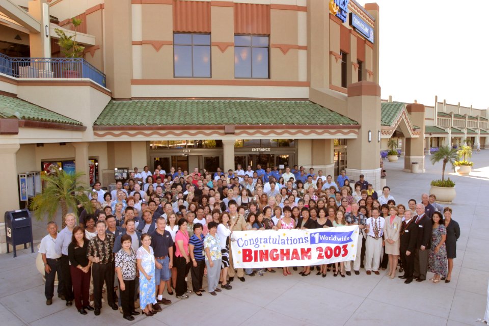 US Navy 040723-N-3228G-002 Employees gather in front of the Pearl Harbor Navy Exchange (NEX) with Commander, Navy Region Hawaii-Commander, Naval Surface Group, Middle Pacific, Capt. Ronald R. Cox, for a group photo