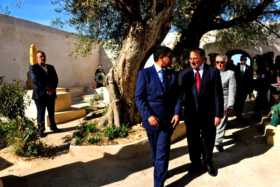 US Navy 111217-D-BW835-003 U.S. Defense Secretary Leon E. Panetta, right, tours a cemetery on the shores of Tripoli, Libya