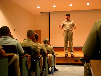 US Navy 040712-N-0962S-002 Master Chief Petty Officer of the Navy (MCPON) Terry Scott explains his leadership expectations to a class of students at the Senior Enlisted Academy in Newport, R.I photo