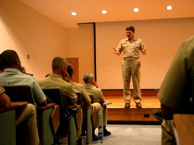US Navy 040712-N-0962S-002 Master Chief Petty Officer of the Navy (MCPON) Terry Scott explains his leadership expectations to a class of students at the Senior Enlisted Academy in Newport, R.I