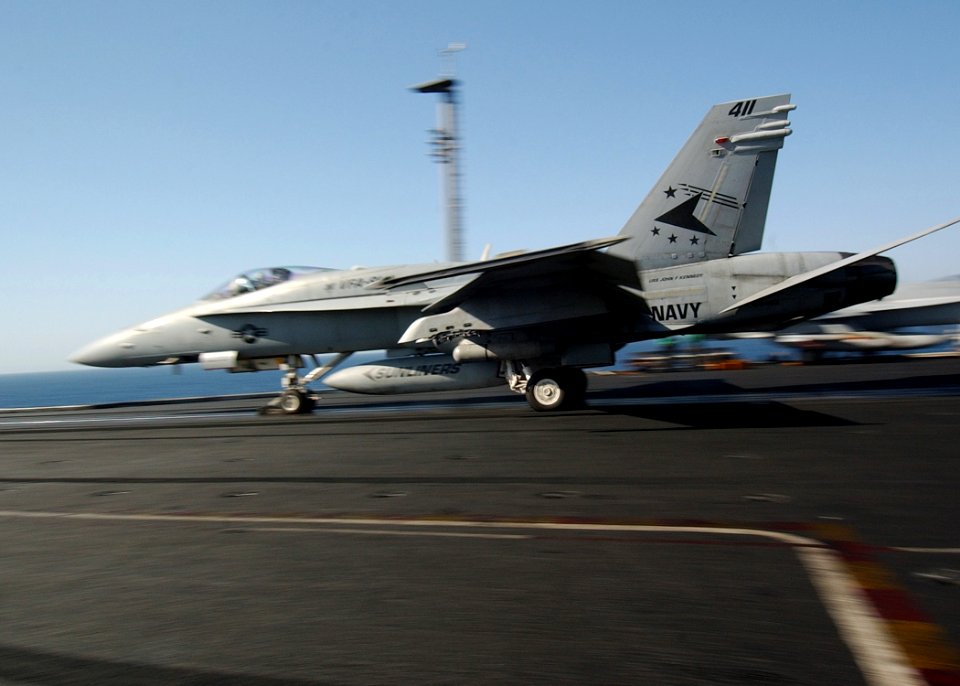 US Navy 040714-N-4374S-003 An F-A-18C Hornet assigned to the Sunliners of Strike Fighter Squadron Eight One (VFA-81) launches from the flight deck of aircraft carrier USS John F. Kennedy (CV 67)