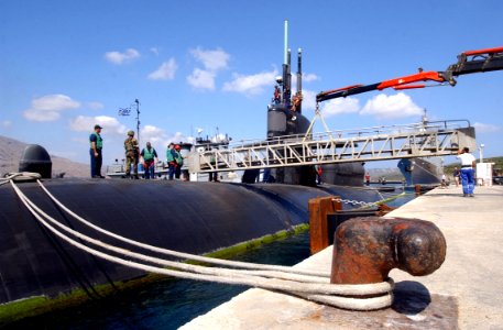 US Navy 040719-N-0780F-023 The Los Angeles-class attack submarine USS Dallas (SSN 700) has its brow removed during preparations to get underway photo