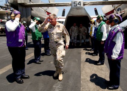US Navy 040719-N-4374S-002 General John Abizaid, Commander, U.S. Central Command, arrives aboard USS John F. Kennedy (CV 67) as he passes through the side-boys on the ship's flight deck