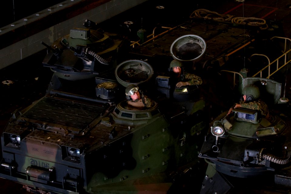 US Navy 120207-N-NL541-287 Amphibious assault vehicles are prepared to disembark from the well deck